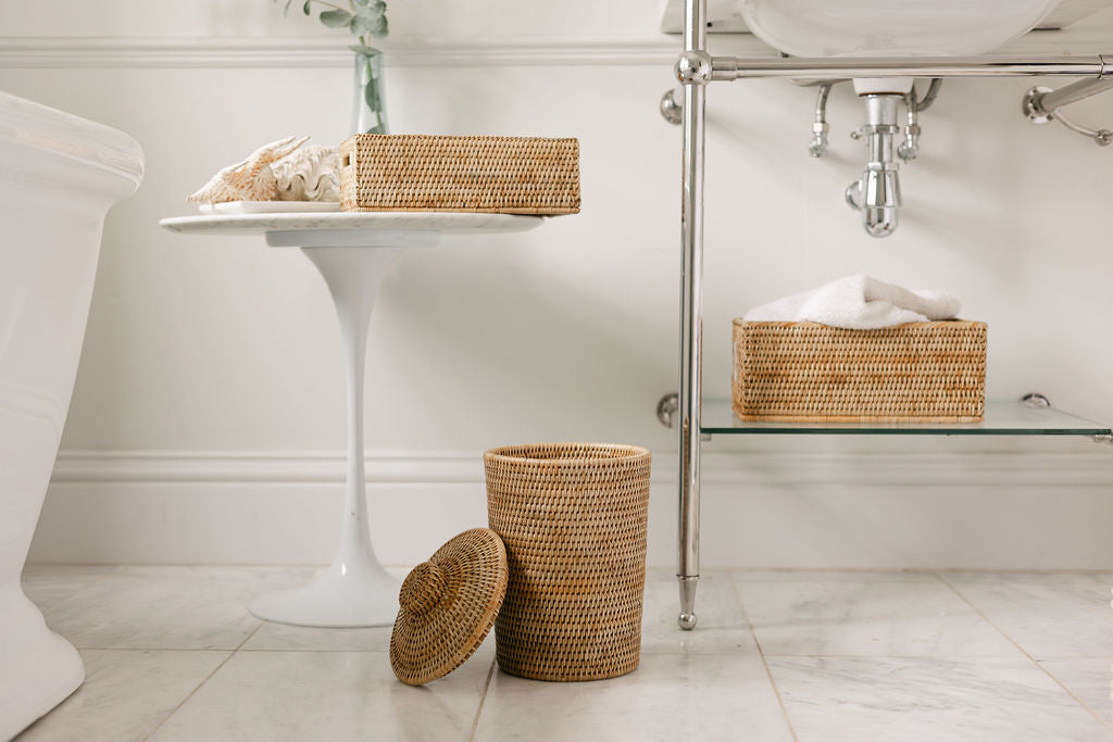 selection of rattan bathroom accessories. Rattan tissue holders and bins in bathroom