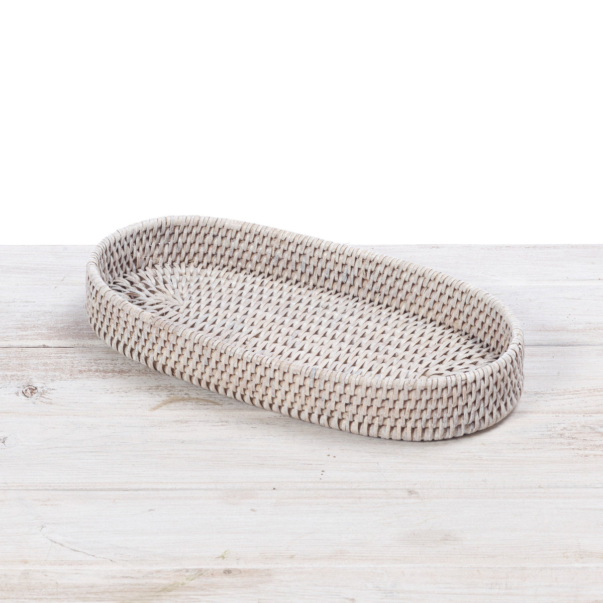 white oval rattan tray