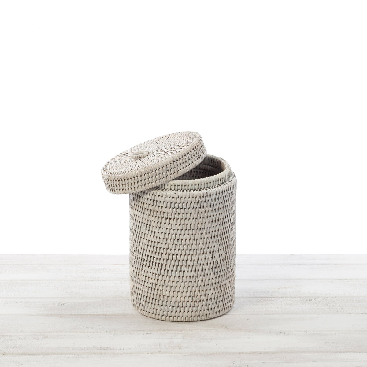 small white rattan toilet roll holder