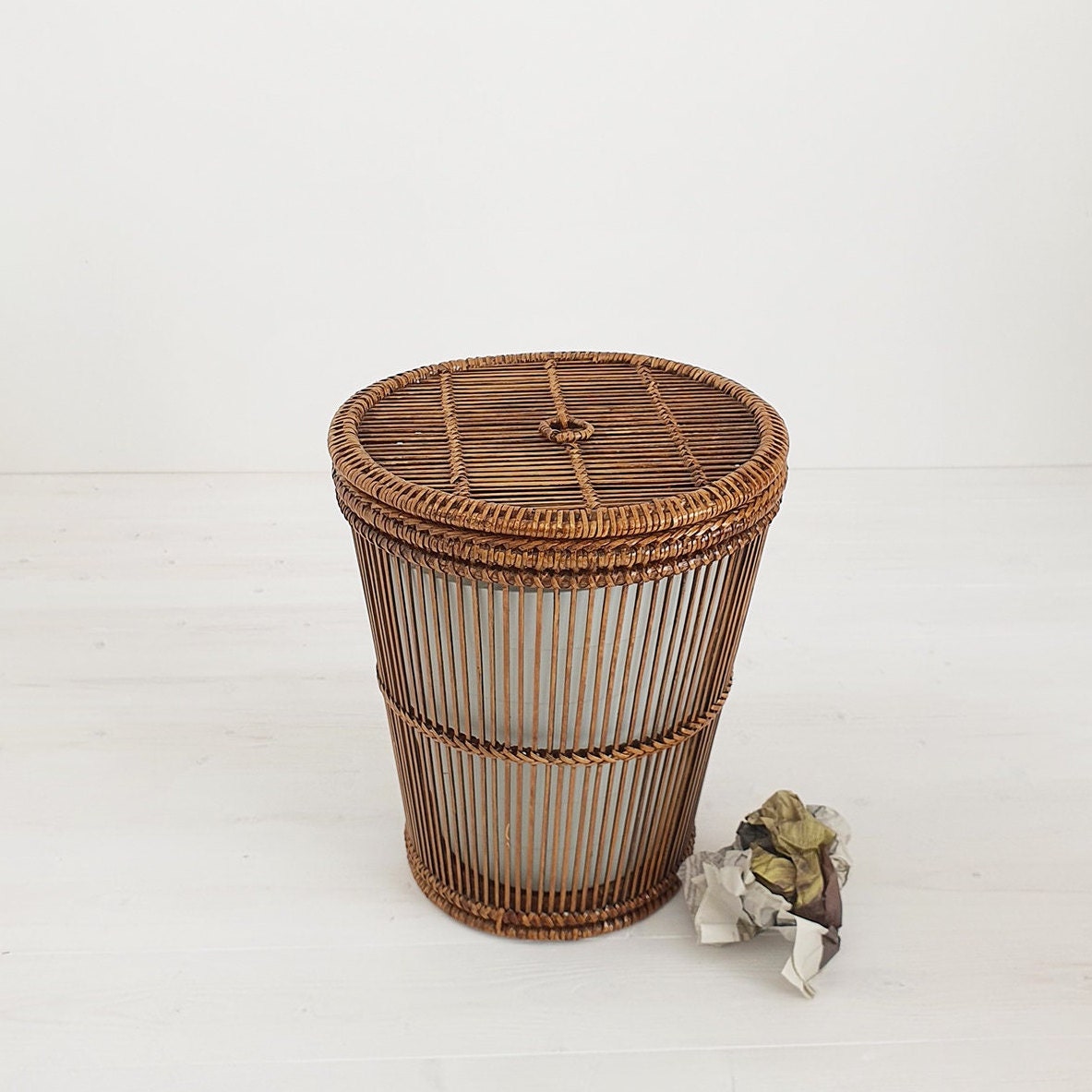 dark rattan bin with bamboo liner and lid